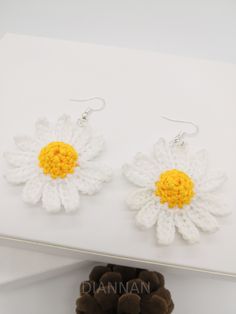 Crochet Earring, Knit weaving drop earring- the daisy sunflower design Width: 4cm Height: 6cm Weight:10g WORLDWIDE SHIPPING WITH China EMS WITHIN 7 OR 15 BUSINESS DAYS PRIORITY MAIL, INSURANCE AND TRACKING NUMBER CAREFUL PACKING IN BUBBLES ENVELOPE Your satisfaction is my priority! Please do not hesitate to contact me for any question, I would be happy to help you. Thank you for visiting my shop! Crochet Sunflower Jewelry, Daisy Earrings Crochet, Yellow Sunflower Dangle Earrings, Miao Silver, Crochet Flower-shaped Earrings For Gift, Yellow Flower-shaped Earrings, Bohemian Table, Sunflower Design, Bubble Envelopes