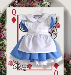 Celebrate your little one's special day with our Classic Alice in Wonderland Birthday Dress. Inspired by the beloved character, this dress is perfect for birthday parties, costume events, and imaginative play. Bring a touch of Wonderland magic to your child's wardrobe with this enchanting dress. Order now and make their birthday unforgettable! **Features - Classic design inspired by Alice in Wonderland - Perfect for birthday parties, themed events, and cosplay - This apparel will fit perfectly f Princess Style Dresses With Ruffles For Cosplay, Cute Snow White Dress For Dress-up, Themed Dresses For Halloween Events, Themed Halloween Dresses, Playful White Princess Dress For Dress-up, Cute Ruffled Fairy Dress For Costume Party, Snow White Costume Dress For Cosplay Events, White Dress For Costume At Cosplay Events, White Princess Costume For Cosplay