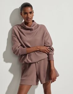 An elevated alternative to the classic sweat in our signature DoubleSoft™️ fabric, Betsy is your oversized wardrobe staple. With an elegant cowl neck and contemporary panel detailing, the Betsy sweatshirt comes in our soft and lightweight DoubleSoft™️ fabric, ensuring all-day comfort. The versatile draw cord at the hem allows for customizable styling, making it a perfect addition to any wardrobe. Style #VAR00979 The Betsy is cut for an oversized fit. Take your true size. Our models wear a size S Vogue Home, Face Sweating, Funnel Neck Sweatshirt, Cowl Neck Sweatshirt, Timeless Wardrobe Staples, Pink Sweatshirt, Sweatshirt Designs, Barley, Black Charcoal