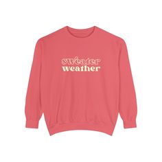 Bundle up, buttercup! Our "Sweater Weather" Sweatshirt is here to wrap you in a cozy embrace warmer than your ex's apology text. This isn't just a sweatshirt – it's a wearable ode to that magical time of year when leaves turn crisp and your dating standards turn flexible. Perfect for sipping pumpkin spice lattes, pretending to enjoy football, or aggressively cuddling your cat while scrolling through dating apps. With this sweatshirt, you're not just embracing autumn, you're practically french-ki Trendy Winter Sweater For Leisure, Winter Sweater With Text Print For Loungewear, Trendy Cozy Fit Cotton Sweater, Trendy Cotton Loungewear Sweater, Fall Leisure Crew Neck Sweater, Trendy Fall Sweater For Leisure, Trendy Cozy Sweatshirt For Loungewear, Trendy Winter Sweats For Leisure, Leisure Crew Sweater For Fall