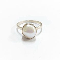 -PRODUCT TYPE - STERLING SILVER PEARL RING -MATERIAL - SILVER -PURITY - 925 -PEARL WEIGHT - 3.40 CARAT -SILVER WEIGHT - 925 - 1.540 GRAMS APPROX -TOTAL WEIGHT - 2.220 GRAMS APPROX 925 SILVER JEWELRY - We are Introducing this new collection of Silver jewelry which is distinctive and unique. We have used natural pearl stone of superb quality. So, here We launch this item on etsy! Minimal & Simple, 925 Sterling Silver Rings. Pearl Understated Luxury. - Delicate Silver ring. - Made to order, jus Sterling Silver White Gold Pearl Ring, White Gold Sterling Silver Pearl Ring, Everyday Sterling Silver Pearl Ring In Silver, Everyday White Gold Pearl Ring In Sterling Silver, Everyday White Gold Sterling Silver Pearl Ring, Adjustable Sterling Silver Pearl Ring For Everyday, Elegant Sterling Silver Pearl Drop Ring, Everyday White Pearl Ring In Sterling Silver, Adjustable Everyday Pearl Drop Rings