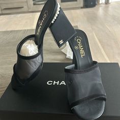 Chanel 22a Black Mesh Pearl Cc Logo Block Heel Backless Mule Sandal Pump 39********** Chanel ********** Brand: Chanel Size: 39 (Know Your Chanel Size) Name: Mules Color: Black Style: Block Heel Sandals Style#: G39252 X56688 94305 Season: 22a Material: Mesh, Suede Calfskin These Have Never Been Worn And Sitting In My Closet. Retail Price Is In Photos And You Can No Longer Get. Comfortable Thick Block Heel. Pearl Around Back Heel Trim Cc Inside Heel Pearl Logo Black Suede Calfskin And Mesh Materia Elegant Sandals With Reinforced Flat Heel, Luxury Evening Flats, Luxury Flat Heels For Evening, Designer Heels With Removable Insole, Evening Slip-on Heels With Contrasting Heel Counter, Luxury Synthetic Sandals For Formal Occasions, Luxury Black Synthetic Heels, Black Luxury Synthetic Heels, Luxury Slip-on Heels For Evening