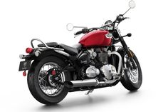 a red and black motorcycle on a white background