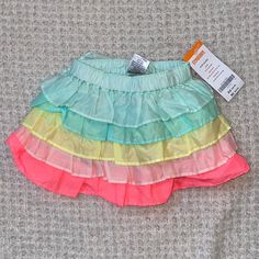 Gymboree Skirt Size 6-12 Months Excellent Condition New With Tags Adorable Bin#7 Multicolor Bottoms For Playtime In Spring, Summer Playtime Cotton Skirt, Summer Cotton Skirt For Playtime, Cotton Skirt For Summer Playtime, Playful Skirted Bottoms With Elastic Waistband, Cute Blue Tiered Skirt Bottoms, Multicolor Ruffled Cotton Bottoms, Cute Blue Tiered Skirt, Multicolor Cotton Ruffled Bottoms