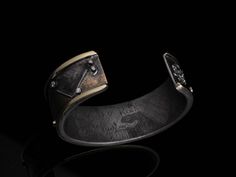 Inspired by a client, who was interested in a companion piece for his Pushing the Rock buckle, James Christian created this beautifully executed cuff in August of 2019. As with the Pushing the Rock buckle, the rocks (diamonds) get smaller and increase in quality as they are pushed up the steep hill. At one end of the cuff is the James Christian jester in platinum, the other end features a semicolon made of platinum with 2 white diamonds. The significance of the semicolon addresses the philanthro Luxury Handmade Cuff Bracelet For Formal Occasions, Luxury Handmade Formal Cuff Bracelet, Luxury Handmade Cuff Bangle, Luxury Jewelry With Custom Hardware, The James, White Diamonds, Diamond White, The Rock, Push Up