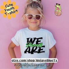 What a cool way to show your school spirit! Stand out from the crowd with this Boldly styled shirt. Available in black/white Youth Sizes for now. Adult sizes will be available in the near future :) -Youth Finished Measurements                                                  XS        S          M          L            XL Body Length                      17 1/2     19 1/4         22      23 1/2 25 1/2 Chest Width (Laid Flat)14       15        16        18           19 Free Shipping. School Spirit Slogan Tops For Streetwear, Summer Streetwear T-shirt With School Spirit, Spring Streetwear T-shirt With School Spirit Style, Green Streetwear Tops For School Spirit, Casual School T-shirt With Logo Print, Spring School Spirit T-shirt For Streetwear, White Team Spirit T-shirt For School, White Team Spirit School T-shirt, White T-shirt With School Spirit For Streetwear