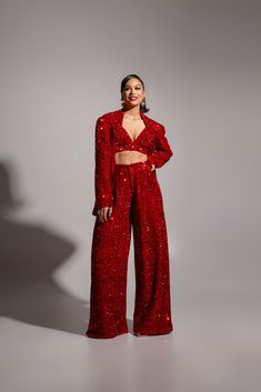 Introducing our stunning LIZA Sequin Set in RUBY – a dazzling combination that guarantees you'll be the centre of attention at any special event. This eye-catching duo merges the richness of ruby red velvet with intricate sequin details, creating a look that effortlessly balances opulence and modern style.The crop top, Red Blazer Outfit Night, Red Combination Outfits, Red Performance Outfits, Ruby Red Outfit, Red And Gold Outfit, Ruby Outfit, Flow Fest, Andrew Davila, Sequin Bra Top