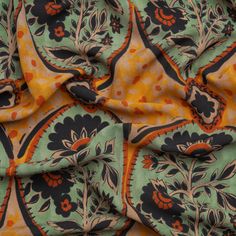 an orange and green paisley print fabric