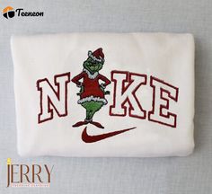 a white towel with the word'n ikee on it and an image of a grin