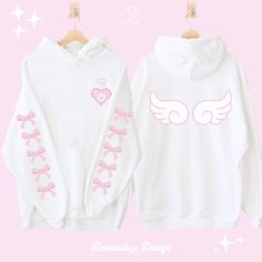 Just being with you, my digital heart flutters and my world opens up like the wings of an angel ₊˚ʚ♡ɞ˚₊ ✧ Blue version  here: https://www.etsy.com/listing/1578648001/angelcore-pixel-heart-hoodie-j-fashion ✧ More Kawaii Fashion: https://www.etsy.com/shop/RainieshopDesign/edit?ref=seller-platform-mcnav§ion_id=45222503 ✮ ⋆ ˚｡  PRODUCT DETAILS  ⋆｡o✩ ♡ Gildan Unisex Heavy Blend™ Hooded Sweatshirt   ♡ 50% cotton, 50% polyester (fiber content may vary for different colors) ♡ Medium-heavy fabric (8.0 oz White Long Sleeve Kpop Sweatshirt, White Kpop Style Long Sleeve Sweatshirt, Kawaii White Hoodie Sweatshirt, White Kawaii Hoodie For Streetwear, White Kawaii Hoodie Sweatshirt, White Kawaii Hoodie Top, White Kawaii Sweatshirt For Streetwear, Cute White Hoodie For Streetwear, White Hooded Kawaii Top