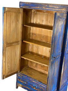 an old wooden cabinet with open doors on the front and side, painted in blue