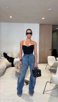 Kim Kardashian Graphic Tee Outfit, Kim Kardashian In Cargo Pants, Summer Fits Women Aesthetic, Kim Kardashian Paris Fashion Week, Kim Kardashian Aesthetic Outfits, Kim K Casual Outfits Street Style, Kim Kardashian Denim Outfit, Casual Night Out Outfit Black Women, Classy Girls Night Out Outfit