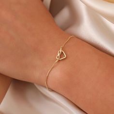 Delicate Yellow Gold Heart Bracelet For Anniversary, Elegant Open Heart Bracelets For Mother's Day, Minimalist Heart Bracelet With Adjustable Chain For Anniversary, Yellow Gold Heart Bracelet For Mother's Day, Elegant Open Heart Bracelets, Elegant Yellow Gold Open Heart Bracelet, Delicate Gold Heart Bracelet For Anniversary, Elegant Open Heart Bracelets For Everyday, Dainty Yellow Gold Heart Bracelet For Mother's Day