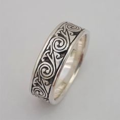 "Wind" belongs to our Elements series.  The ancient Celts had an intrinsic relationship with the universe and all its elements: fire, air, water, and earth. The spirals on this handmade ring signify one of the key elements: AIR.  This ring is offered in two widths: 5.5 mm and 6.5 mm. Earth Ring, Celtic Band, Celtic Spiral, Ancient Celts, Element Earth, Spiral Ring, Silver Band, Handmade Ring, Beautiful Rings