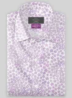 Channel a peaceful elegance with our Liberty Amati Cotton Shirt. Firstly, the shirt is constructed with pure cotton fabric that provides a delicate, supple and crisp yet easygoing style that evokes a laid-back vibe with a flowery pattern over a lavender shade.  Also, take a stylish turn with proficient tailoring with a relaxed fit and laid-back style that balances the edge and comfort that holds the sartorial limelight while attending the taste of summer tours and pool parties.  Made according t Spring Cotton Dress Shirt With Short Sleeves, Relaxed Fit Dress Shirt For Summer Daywear, Elegant White Shirt With Floral Print, Summer Cotton Dress Shirt, Relaxed Fit, Summer Cotton Dress Shirt With Relaxed Fit, Relaxed Fit Cotton Dress Shirt For Summer, Spring Cotton Relaxed Fit Dress Shirt, White Short Sleeve Dress Shirt For Spring, Spring Daywear Short Sleeve Dress Shirt