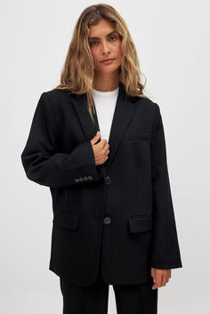 Oversized Twill Blazer Classic Black Blazer Dress For Business, Classic Black Career Blazer Dress, Black Notch Lapel Blazer With Welt Pockets, Formal Black Outerwear With Buttoned Pockets, Black Notched Blazer With Hidden Button Closure, Black Career Blazer With Double Button Closure, Classic Black Blazer Dress With Lapel Collar, Classic Black Blazer Dress For Work, Classic Business Blazer With Buttoned Pockets