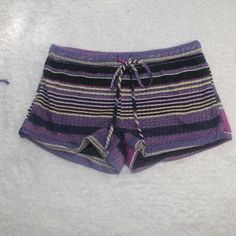 Allover Patterned Print, Elasticized Waistband With Drawstring, Woven Construction, Lined Shorts. Colors Include Three Different Shades Of Purple, Black, White, And Yellow For Accent. Due To The Nature Of The Pattern, No Two Shorts Will Look Alike. Nwt Never Been Worn Purple Beachwear Shorts For Beach Season, Purple Beachwear Shorts For Beach, Purple Beachwear Shorts For The Beach, Purple Stretch Beach Shorts, Purple Stretch Shorts For Beach, Purple Stretch Shorts For The Beach, Stretch Purple Shorts For Beach, Purple Cotton Beach Bottoms, Purple Cotton Beach Shorts