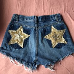 Nasty Gal After Party Levis Denim Distressed Shorts With Gold Stars On The Back #Nastygal #Levis #Afterparty Originally $88 Never Worn Star Jean Shorts, Party Cutoff Denim Shorts, High Rise Jean Shorts For Festival, Denim Party Shorts, Trendy Party Jeans With Pockets, Short Denim Party Jeans, Short Denim Jeans For Party, Short Party Jeans, High Rise Denim Festival Shorts