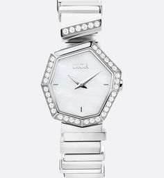 White mother-of-pearl dial
Polished dauphine hands
Anti-glare sapphire crystal
Case: 27 mm (1) steel
Steel bezel set with 31 brilliant-cut diamonds (0.56 ct) with white mother-of-pearl insert
Steel crown
Water resistant: 30 meters (98 feet)
Asymmetric steel links, end link set with six brilliant-cut diamonds (0.15 ct)
Additional interchangeable black calfskin bracelet with steel finishes, set with six brilliant-cut diamonds (0.17 ct)
Quartz movement
Functions: Hours – Minutes
Two-year warranty
M Dior Watch Women, Dior Watches, Victoire De Castellane, Dior Watch, Dior Women, Dior Star, Watch Women, Star Shoes, Silver Cufflinks