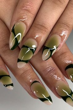 Hey everyone! As someone who's always on the hunt for the next big thing in nail art, I've recently been diving into the world of "baddie" nail designs. These aren't just your regular manicure styles; #green #nail #design #ideas Cheap Cute Nails, Long Almond Nails Green, Save Green Nails, Nails Green And Brown, Green Cateye Nail, Green Winter Nail Designs, Ferxxo Nails, Green Baddie Nails, Brown And Green Nails