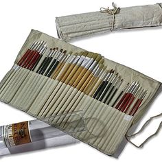 an assortment of paint brushes in a case