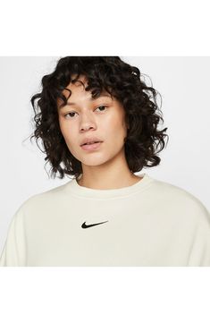 An embroidered Swoosh adds minimal branding to this cozy fleece sweatshirt cut for a relaxed, oversized fit that's enhanced by the dropped shoulders. 22" length (size Medium) Crewneck 80% cotton, 20% polyester Machine wash, tumble dry Imported Nike Sportswear Phoenix Fleece, Studded Accessories, Luxury Loungewear, Oversized Crewneck, Women's World Cup, Loungewear Luxury, Cut Sweatshirts, Nike Tech Fleece, Lace Headbands