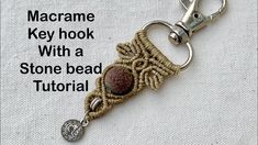 a key chain with a stone bead design on it and the text macrame key hook with a stone bead tutor