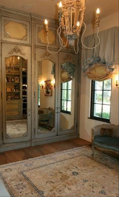 an ornately decorated living room with chandelier