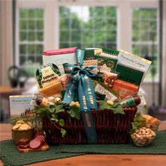 a basket filled with lots of food sitting on top of a table