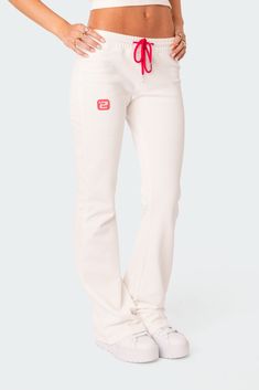 PRODUCT INFO Sweatpants Flared leg Adjustable tie waist Embroidered logo Matching set Cotton, Spandex Model wears size S Model height is 5'6 Item care: Wash with similar color Flared Sweatpants, Outfit Pieces, Buy List, Chill Fits, School Clothes, Fashionista Clothes, Swimwear Dress, Grey Sweatpants, Clothing Stores