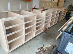 the shelves are made from plywood and ready to be built into wall mounted shelving units