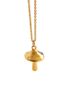 A long mushroom pendant necklace with a delicate 14K/20 gold-filled flat cable chain. The small gold plated brass mushroom pendant measures 11mmx15mm. The necklace has a 33" length chain with a spring ring clasp. Details: Detailed mushroom pendant necklace Small gold plated brass mushroom pendant / 11mmx15mm 14k/20 gold-filled flat cable chain 5.9mm spring ring clasp 33” total chain length Designed & assembled in the USA from imported materials. Long Mushroom, Aura Necklace, Clay Inspo, Mushroom Ring, Mushroom Necklace, Mushroom Pendant, Tassel Bracelet, Dream Jewelry, Contemporary Jewelry