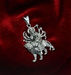 925 sterling silver handmade custom design vintage antique style Indian Hindu Goddess Durga Maa or Bhawani Mata pendant, best wishes blessing gift for your special person, excellent jewelry from India. Metal-925 sterling silver. Item type-Pendant. Length-4.8 centimeters. Width-2.7 centimeters. Weight-9.310 grams. Stamped-925. Make excellent gifting and collectible pieces(gifts for birthdays, weddings, anniversaries, mother's day, fathers day, Christmas day,) We take absolute care of precious jew Sterling Silver Necklace For Puja And Festivals, Sterling Silver Jewelry For Puja And Festivals, Sterling Silver Jewelry For Diwali Puja, Antique Silver Jewelry For Festivals As A Gift, Antique Silver Jewelry For Festivals And Gifts, Heavy Silver Necklace For Anniversary, Antique Silver Jewelry For Festival Gifts, Traditional Silver Locket Jewelry, Spiritual Sterling Silver Jewelry For Navratri