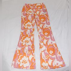 Colorful Orange And Pink Patterned Flare Pants 70s Groovy Floral Style Size Large But Run More Like A Medium; Very Stretchy New With Tags From Amazon Retro Wide Leg Bottoms With Floral Print, Retro Wide Leg Floral Bottoms, Retro Wide Leg Pants With Floral Print, 70s Inspired High Waist Bottoms For Spring, 70s Inspired Flare Bottoms For Spring, Retro Floral Print Bottoms For Spring, Spring Flare Pants With 70s Style, Spring Flare Pants Inspired By 70s, Spring Wide Leg 70s Inspired Pants