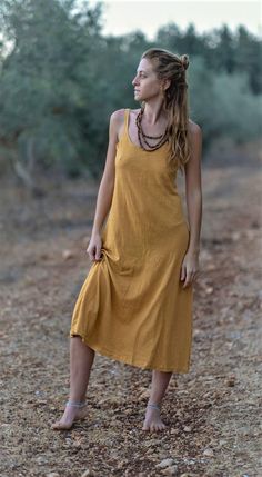 🌿 simple but elegant Open Back dress in natural Mustard color, made From pure Hemp and Organic cotton perfect basic summer dress breathing and natural, fit for Small and Medium sizes . Comes in a variety of colors🌿 FEATURES ※ Relaxed fit ※Spaghetti straps ※Scoop neck ※Below knee length ※Natural colors were used for dyeing. ※Handwash separately, In cold water (up to 86oF /30oC) with similar colors.  ※Dry in shade. SIZING  S & M  S -  Bust 30"-31" (78cm)         Length 45"-46" (115cm)  M - Bust Solid Midi-length Linen Dress For Beach, Solid Midi Length Linen Dress For Beach, Midi-length Linen Dress For Beach, Midi Length Linen Dress For Beach, Hemp Dress, Hemp Clothing, Figurative Artwork, Open Back Dress, Organic Cotton Clothing