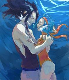 two people in swimsuits are hugging under the water with their arms around each other