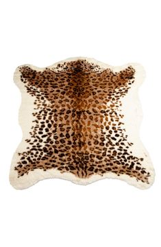 a brown and white animal print rug