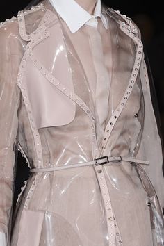 Chiffon shirt & clear plastic coat with studded leather trim; fashion details // Valentino S/S 2013 Raincoat Fashion, Vinyl Fashion, Runway Details, Raincoats For Women, Textiles Fashion, Studded Leather, Rain Wear, Fashion Details, Primavera Estate