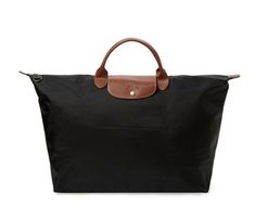 NWT Longchamp 'Le Pliage' Large Short Handle Handheld Type 'L' Foldable Travel Tote Bag - 100% Authentic Guaranteed! From a reliable and experienced Top Rated Plus US seller, 17 years on eBay! Style #: 1624089001 Color: Black (also available in our eBay store Gunmetal Grey, Navy, Bilberry, Arctic, Putty, Honey, Desert and Khaki Brown) New with tag, never been used! With a packable design and roomy interior, Longchamp's leather-trimmed travel bag is a jet-setter's necessity for work or play. Nylo Longchamp Le Pilage Backpack, Longchamp Le Pliage Large, Longchamp Leather, Authentic Designer Handbags, Travel Tote Bag, Jet Setter, Gunmetal Grey, Travel Tote, Longchamp Le Pliage