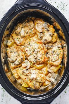 an overhead shot of chicken and potatoes in the slow cooker