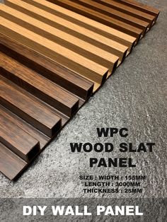 some wood planks are stacked on top of each other with the words diy wall panel