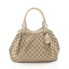 GUCCI Sukey Hand bag 211944 GG canvas leather Beige champagne Gold Used Description / Specification Brand Name GUCCI Item Name GUCCI Sukey Hand bag 211944 GG canvas leather Beige champagne Gold Used Model No. 211944 Color Beige‐ish colors × Gold‐ish colors Material canvas × leather Size H:25cm x W:35cm x D:11.5cm (H:9.8" x W:13.8" x D:4.5") Handle：36cm(14.2") Accessories Dustbag Date Code 527066 Instore Code 2118800105196 Up Date 2024/07/12 Condition Pre-owned used Handbag by GUCCI in good condition. Outside Condition A light sense of use, scratches, scrubbing and stains on the item. Inside Condition A light sense of use, scratches, scrubbing and stains on the item. Please take a look at the descriptions and the pictures above to check the condition of the item before the purchase. Rank Pr Beige Champagne, Up Date, Champagne Gold, Canvas Leather, Hand Bag, Dust Bag, Take That, Gucci, Tote Bag