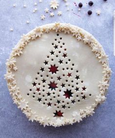 a pie with stars on it sitting on top of a table