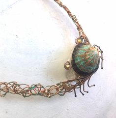 Handcrafted crab from a limpet shell and copper wire, finished with acrylic paint and sealed. The shell can be painted any color. If a color is not available in the options, please text me. The neckband is crocheted, 20g, not tarnish copper wire and is approximately 17' long. very easy to wear. Crab Necklace, Shell, Copper, crocheted, beachy, resort jewelry, cruise jewelry, island style, Artistic Adjustable Jewelry For Beach, Unique Wire Wrapped Beach Jewelry, Unique Beach Jewelry, Artistic Handmade Beach Jewelry, Handmade Shell For Jewelry Making, Unique Handmade Shell For Jewelry Making, Unique Adjustable Shell Necklace, Handmade Copper Jewelry For Beach, Handmade Copper Jewelry For The Beach