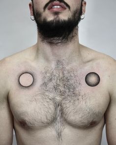 a man with three circles on his chest