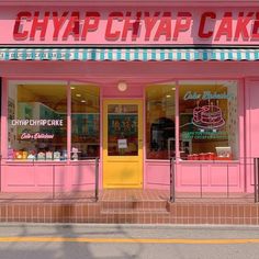 a pink and yellow store front with the words chyap chap cake on it