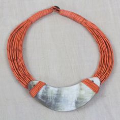 Crescent-Shaped Horn Pendant Orange Leather Cord Necklace - Somo | NOVICA #westafrica #travel #supportartisans #supporthandmade #alwayshandmade #empower #explore #novica Ceramic Pendant Necklace, Cord Necklaces, Braided Leather Necklace, Horn Pendant Necklace, Leather Cord Necklace, Chunky Necklaces, Bone Pendant, Horn Pendant, Leather Corded Necklace