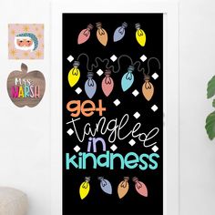 a poster with the words get tangled in kindness on it next to a potted plant