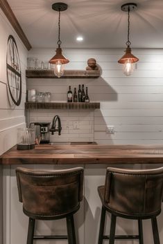 two bar stools sit in front of the counter