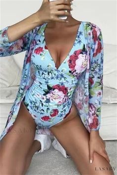 Lasaky - Empowering Prints and Padding in One Stunning Swimsuit Summer Long Sleeve Printed Bodysuit, Summer Pool Bodysuit With Long Sleeves, Summer Long Sleeve Bodysuit For Pool, Beach Season Blue Long Sleeve Bodysuit, Blue Long Sleeve Bodysuit For Beach Season, Long Sleeve Blue Bodysuit For Beach Season, Long Sleeve Beach Bodysuit For Summer, Blue Floral Print Long Sleeve Swimwear, Long Sleeve Bodysuit For Summer Swimming